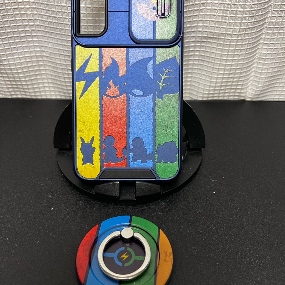 Red and Blue Phone Case with Pokemon Design